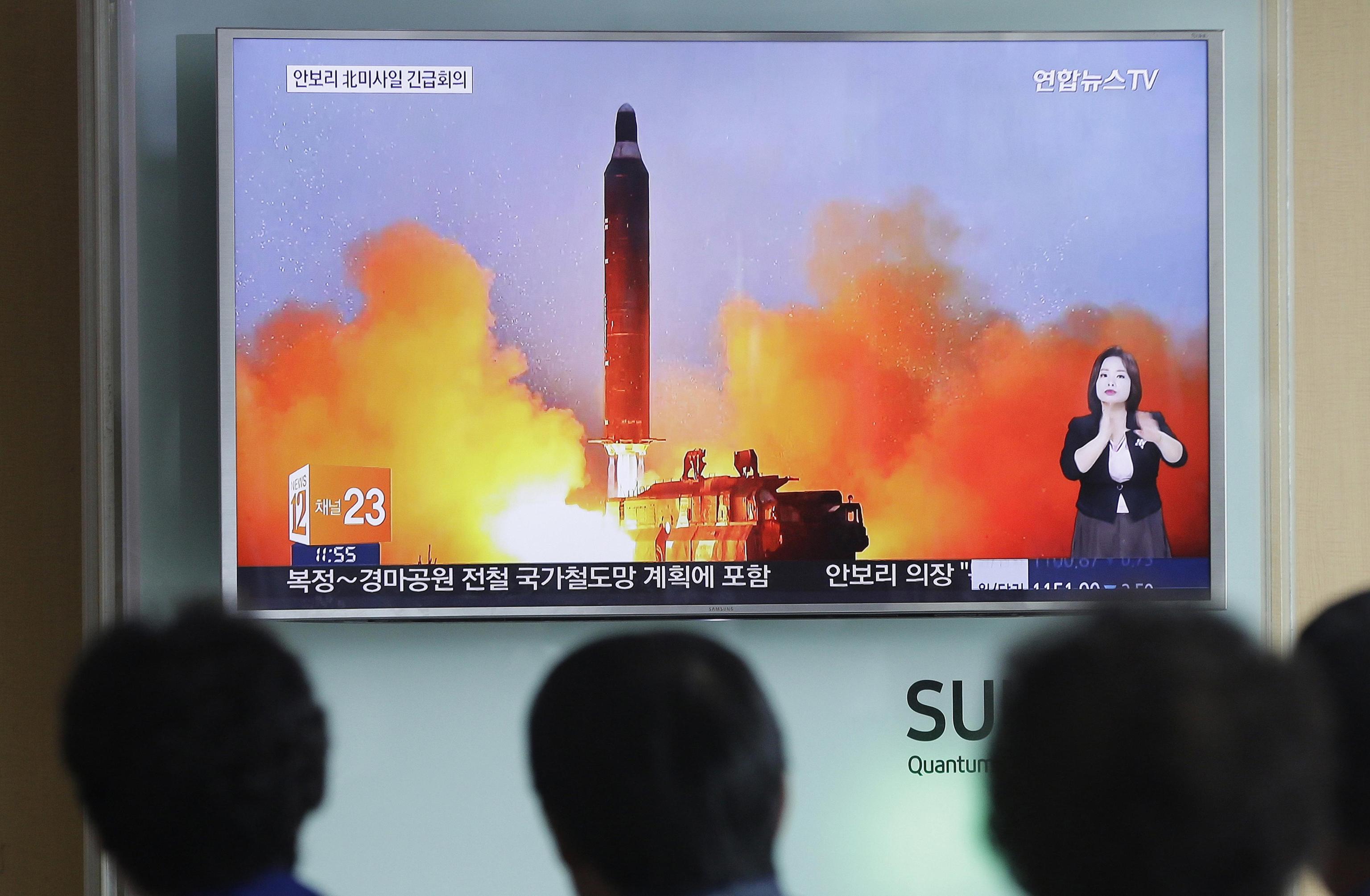 FILE - In this June 23, 2016, file photo, people watch a TV news channel airing an image of North Korea's ballistic missile launch published in North Korea's Rodong Sinmun newspaper at the Seoul Railway Station in Seoul, South Korea. North Korea on Monday, March 6, 2017, fired "several" banned ballistic missiles that flew about 1,000 kilometers (620 miles) into waters off its east coast, South Korea's military said, an apparent reaction to huge military drills by Washington and Seoul that Pyongyang insists are an invasion rehearsal.(ANSA/AP Photo/Ahn Young-joon, File) [CopyrightNotice: Copyright 2016 The Associated Press. All rights reserved. This material may not be published, broadcast, rewritten or redistribu]