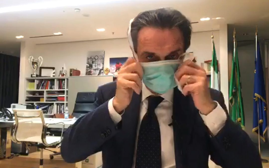 Coronavirus: il governatore in mascherina  In Lombardia è subito polemica